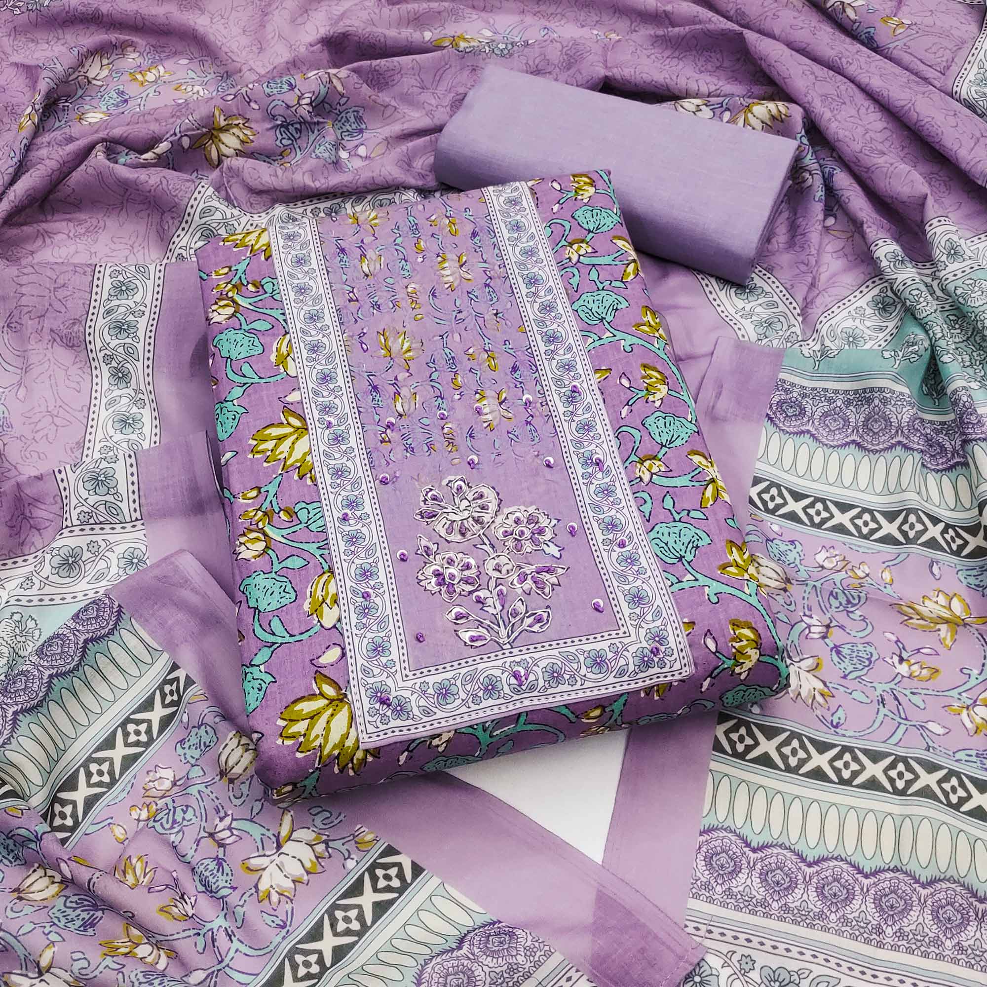 Lavender Pure Cotton Dress Material Adorned with Artistic Floral Patterns