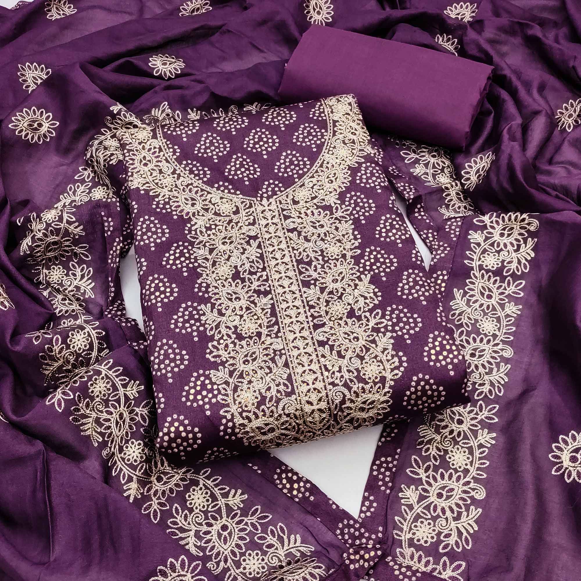 Purple Bandhani Print Cotton Dress Material Accented with Embroidered Neckline