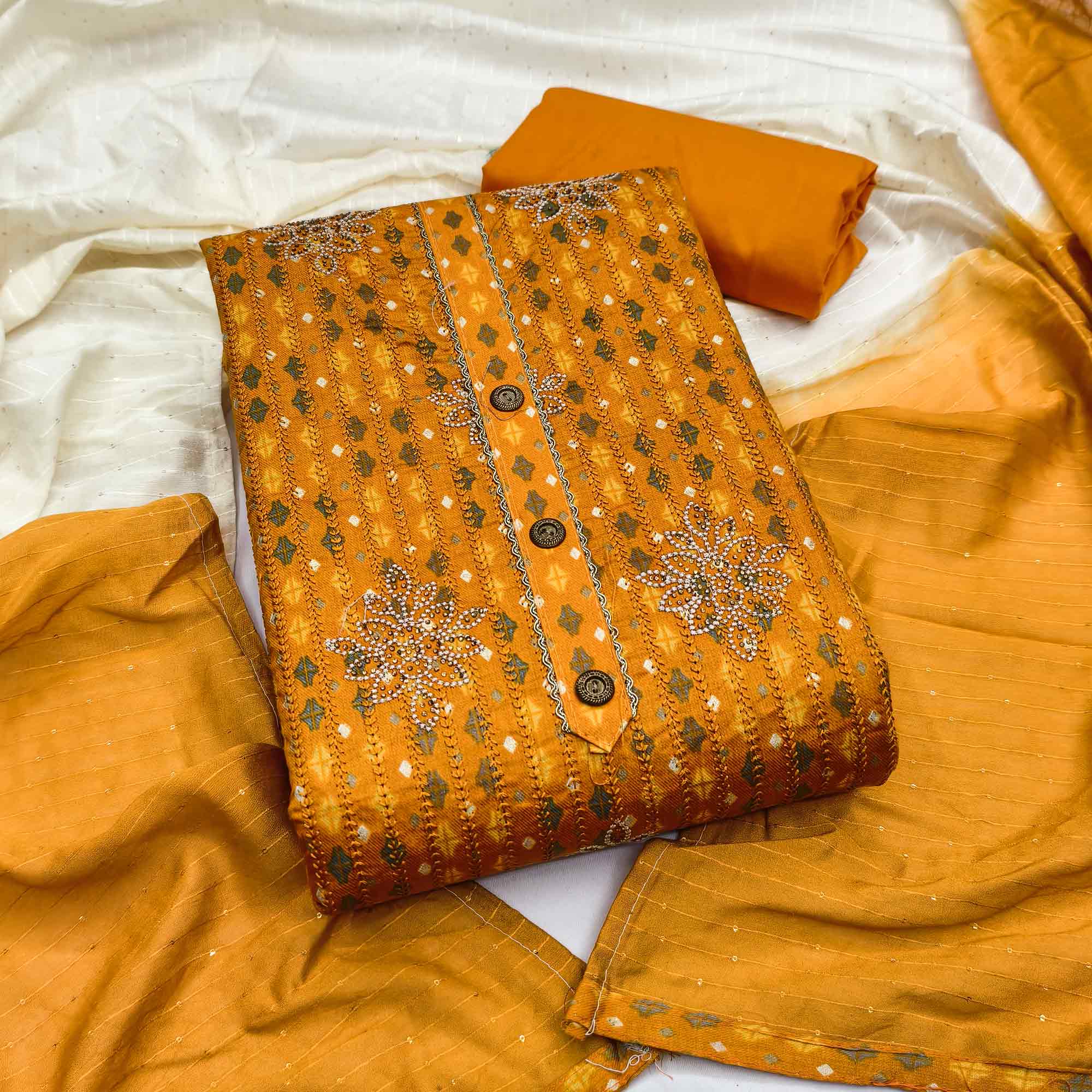 Mustard Cotton Blend Dress Material Adorned With Exquisite Floral Embroidery & Sparkling Stonework