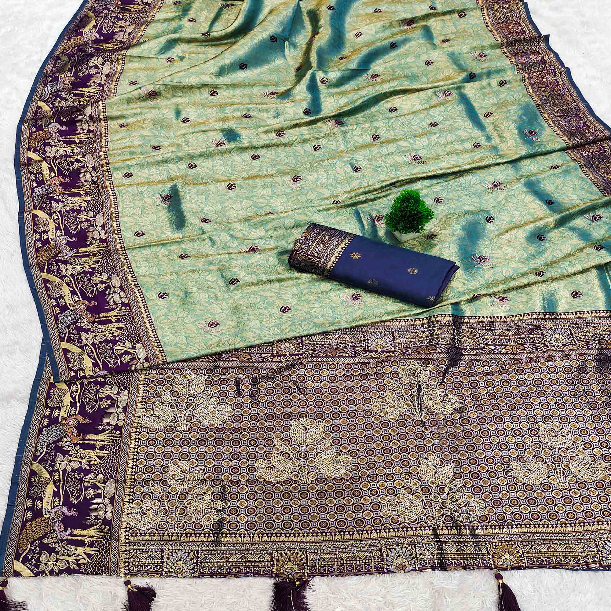 Sea Green Silk Blend Saree Featuring Elegant Floral Weaving Work & A Graceful Tassel Pallu