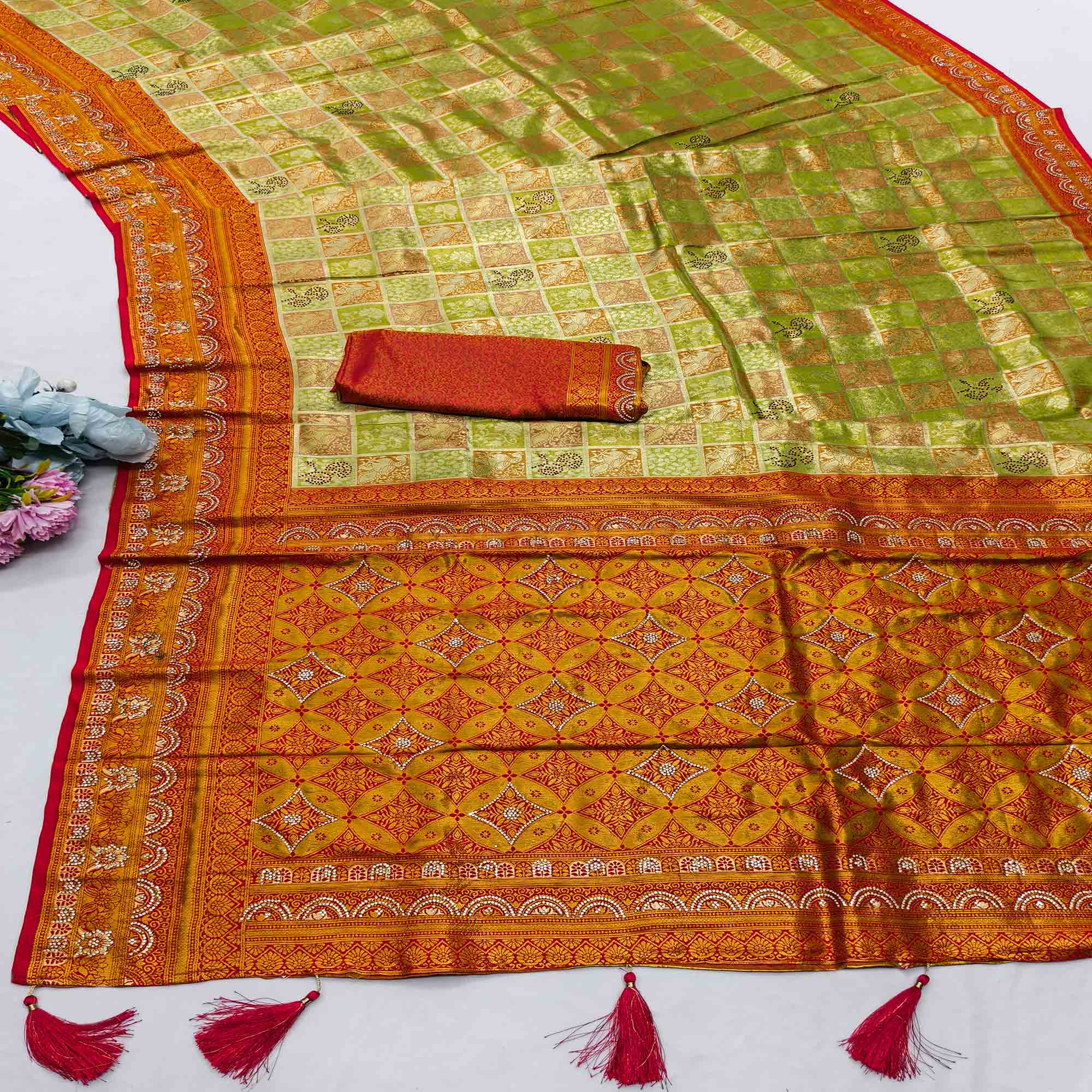 Green Lightweight Cotton Silk Saree Highlighted with Intricate Woven Patterns and Swarovski Sparkle