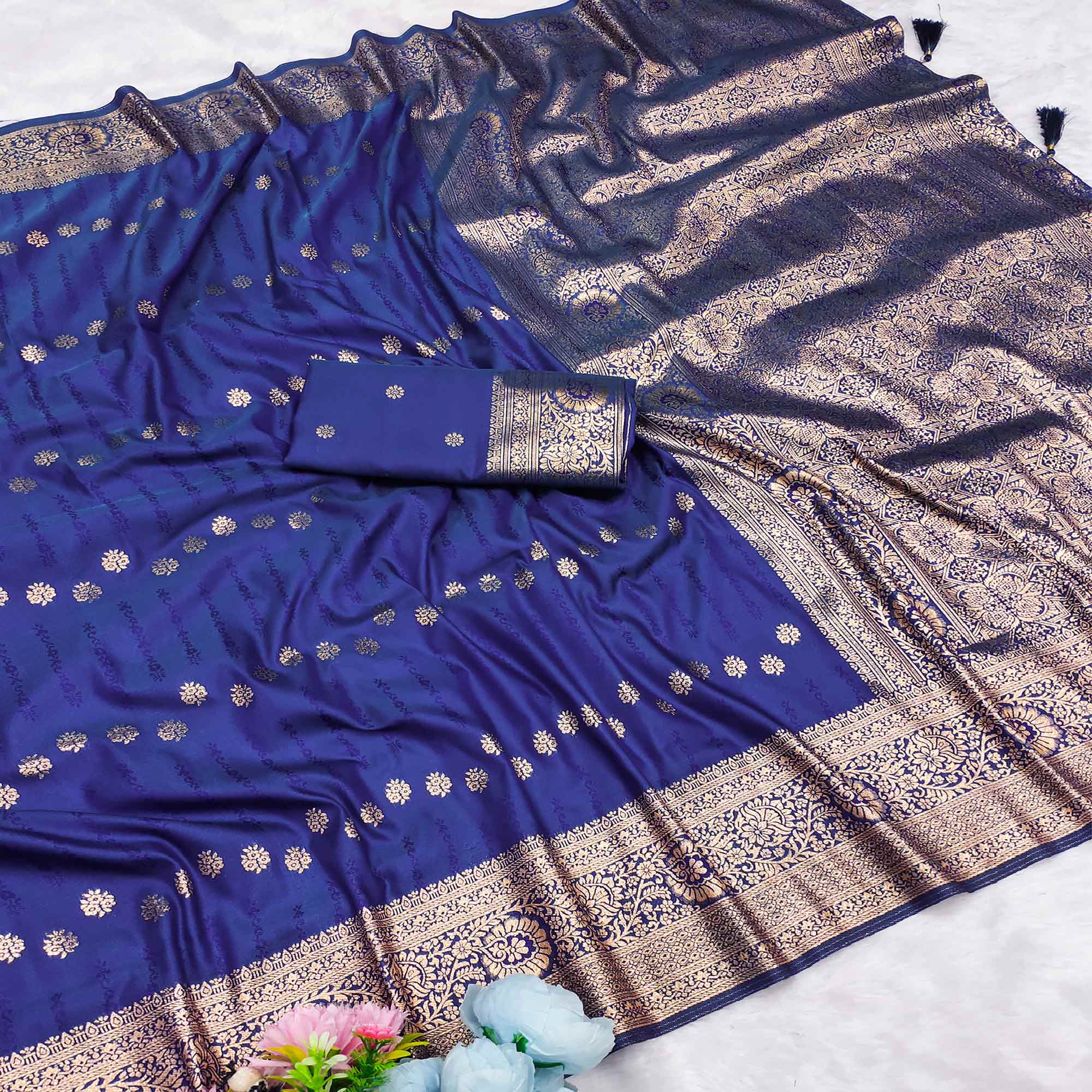 Blue Zari-Woven Cotton Silk Saree Featuring a Graceful Drape and Delicate Tassel Detailing