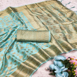 Radiant Turquoise Tissue Banarasi Saree With Intricate Floral Zari Weaving & Stone Embellishments