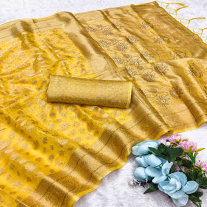 Radiant Yellow Tissue Banarasi Saree With Intricate Floral Zari Weaving & Stone Embellishments