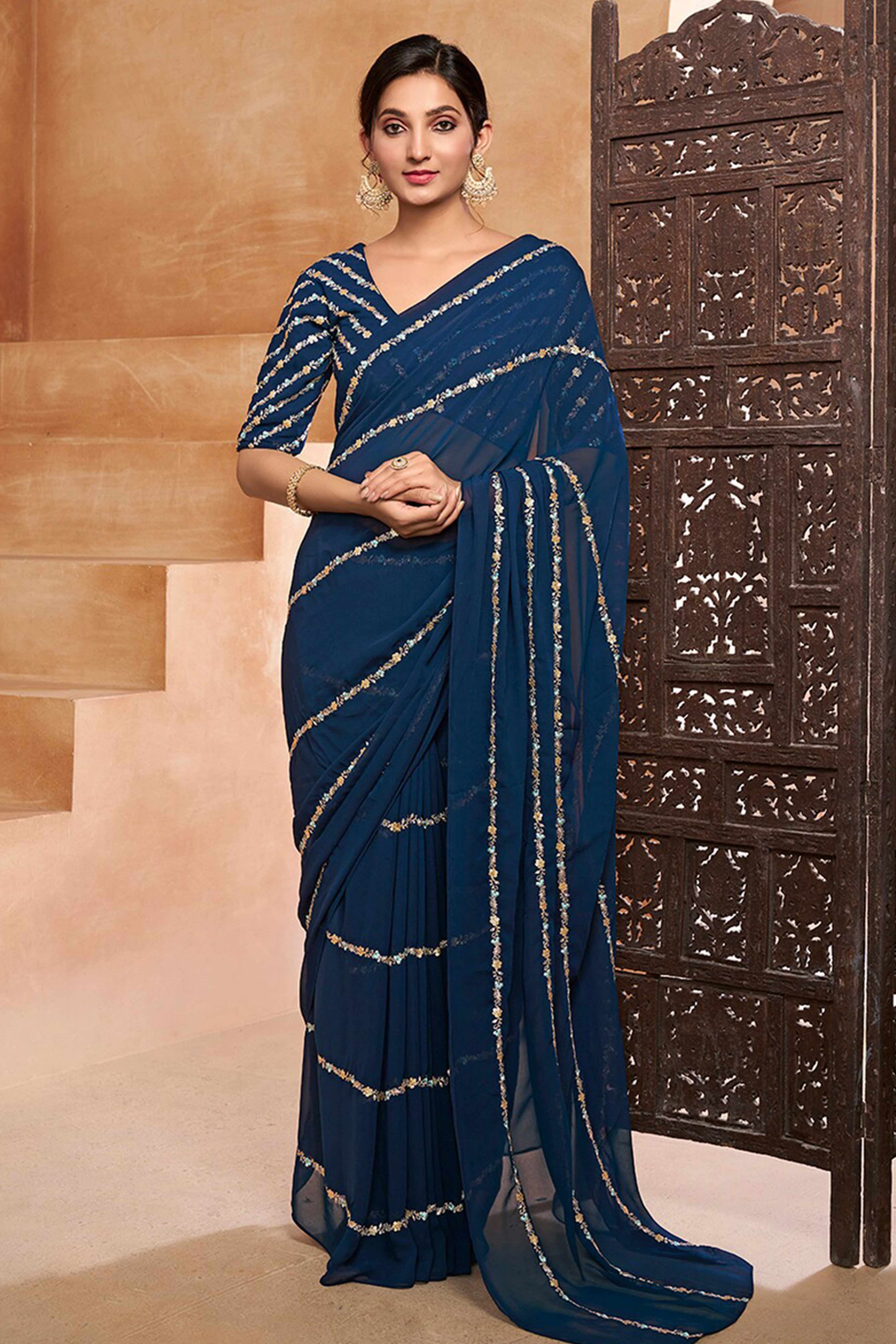 Graceful Blue Floral Georgette Saree Embellished With Fine Sequins Embroidery