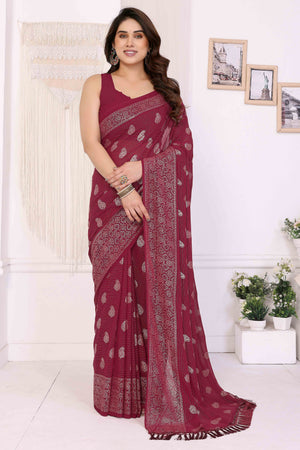 Maroon Foil Printed Georgette Saree Enhanced With Delicate Lace Border & Elegant Tassel