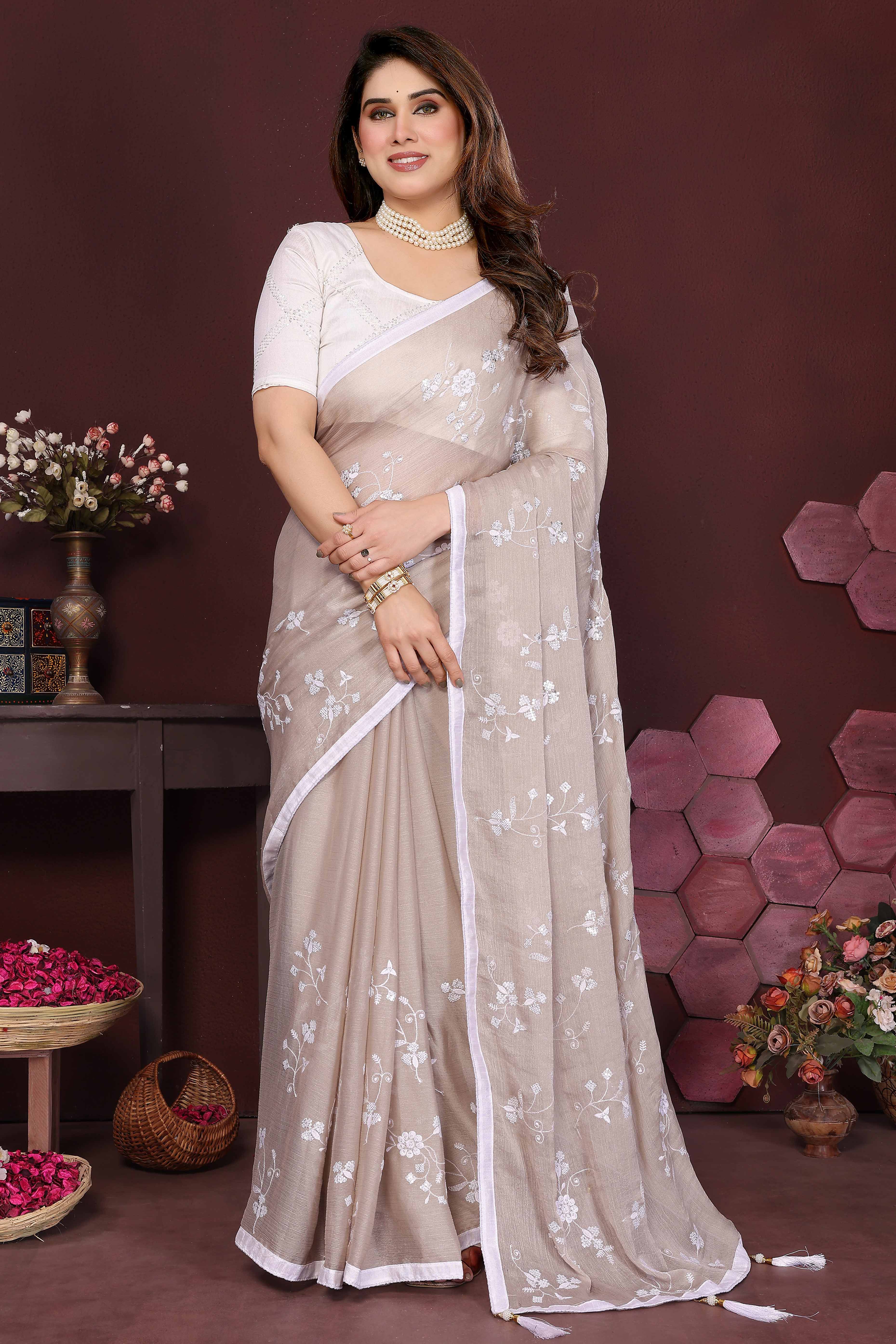 Beige Bloom Saree adorned with Moss Floral Embroidery and Delicate Lace Border
