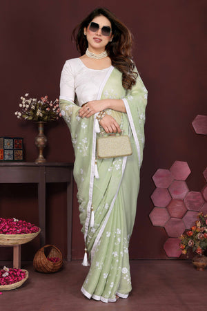 Pista Green Bloom Saree adorned with Moss Floral Embroidery and Delicate Lace Border