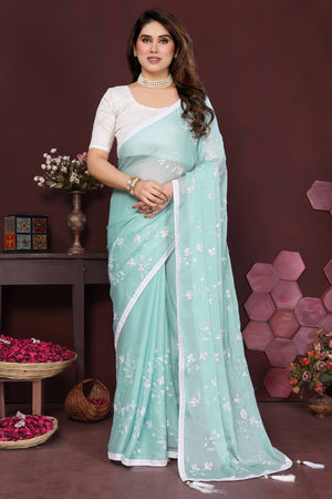 Pale Turquoise Bloom Saree adorned with Moss Floral Embroidery and Delicate Lace Border