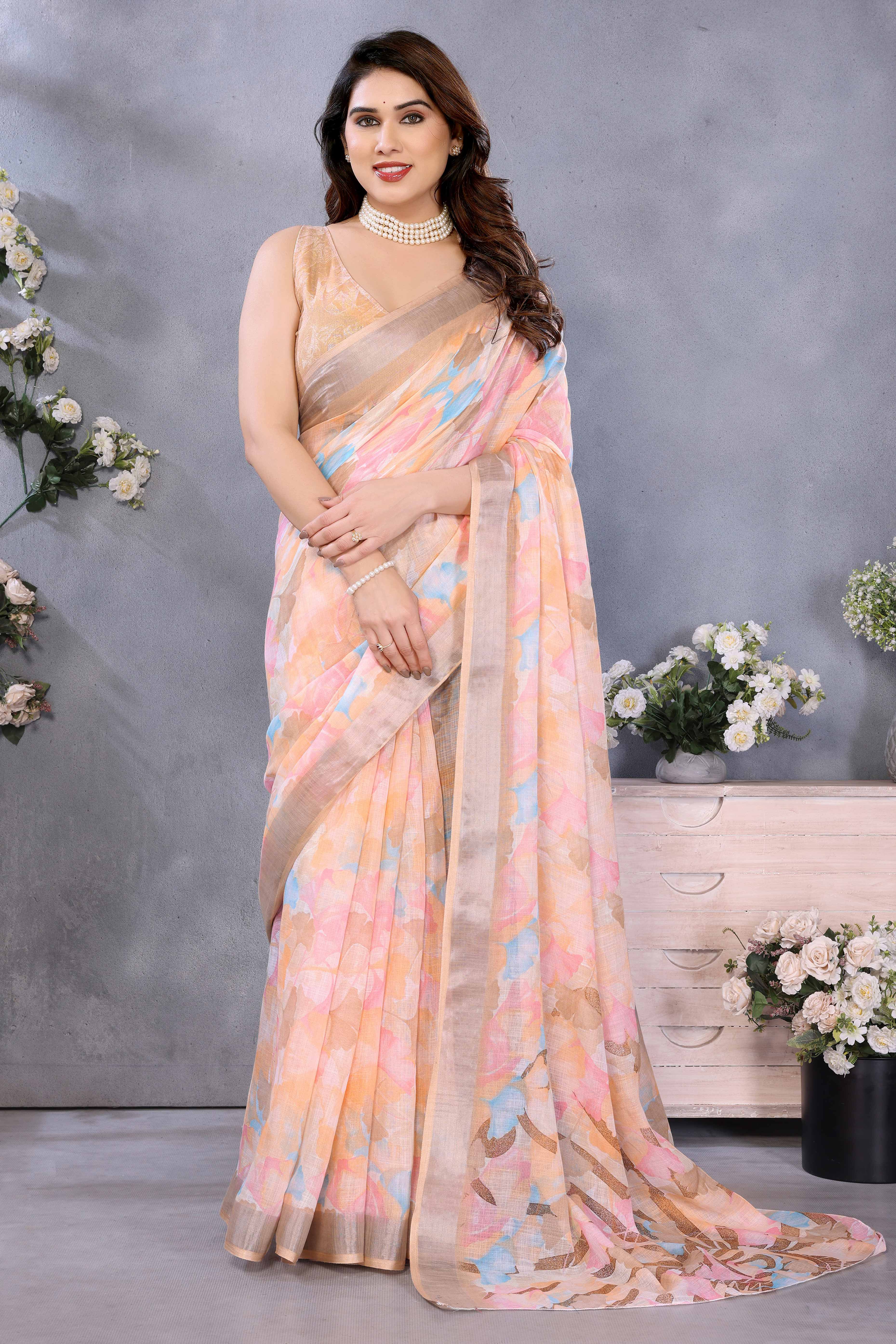 Orange Floral Printed Linen Saree Accented With A Classic Patta Border