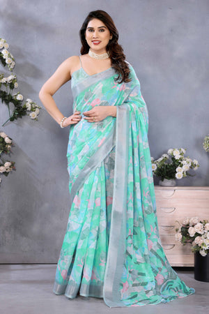 Turquoise Floral Printed Linen Saree Accented With A Classic Patta Border