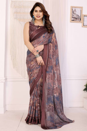 Trendy Brown Moss Crepe Saree with Floral Motifs and Satin Border