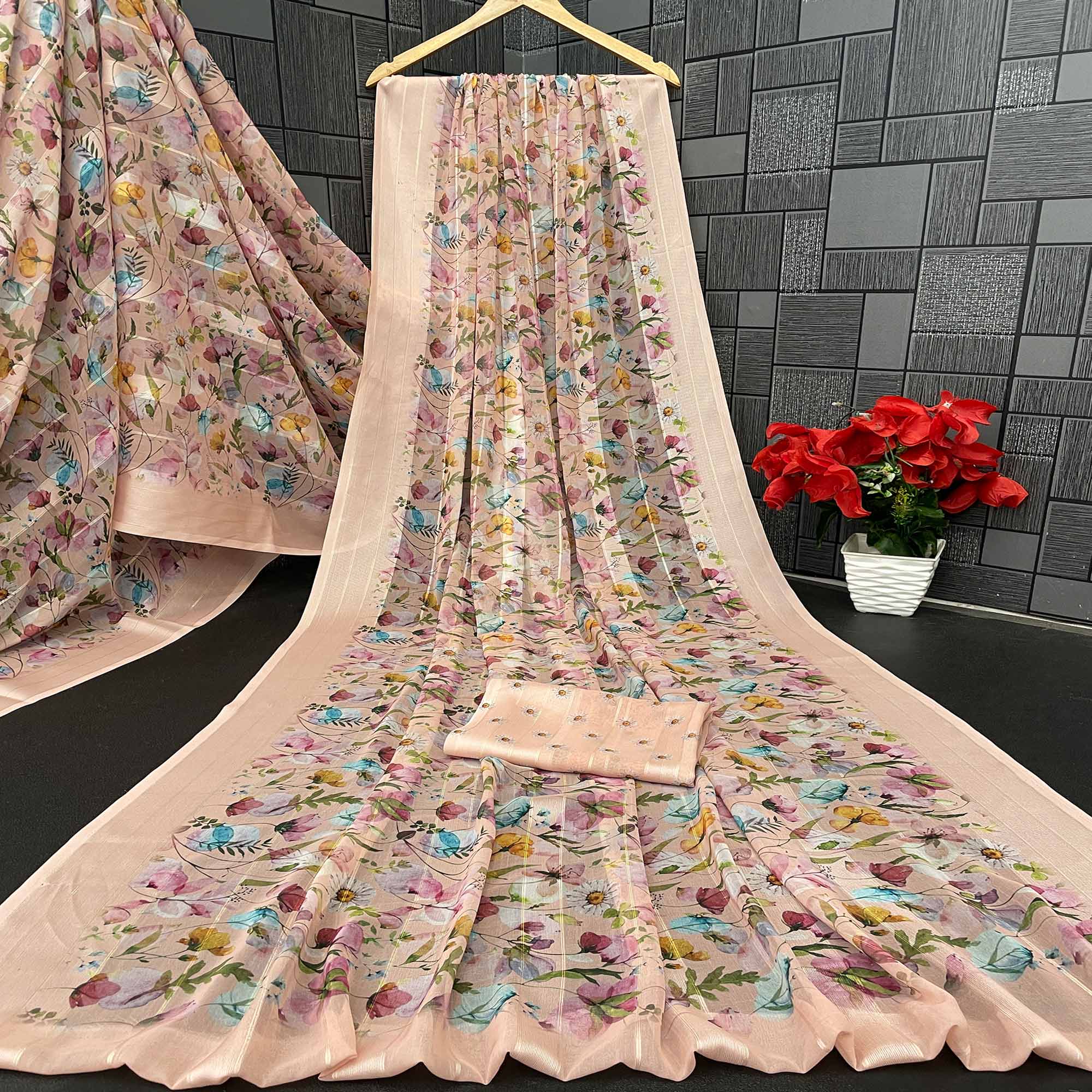 Peach Bloom Floral Digital Printed Georgette Saree Accentuated With Graceful Zari Stripes
