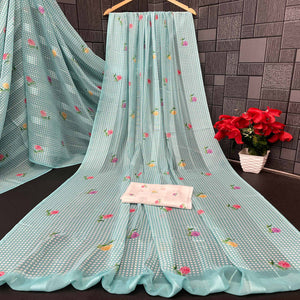 Elegant Sky Blue Floral Digital Printed Georgette Saree With Subtle Detailing