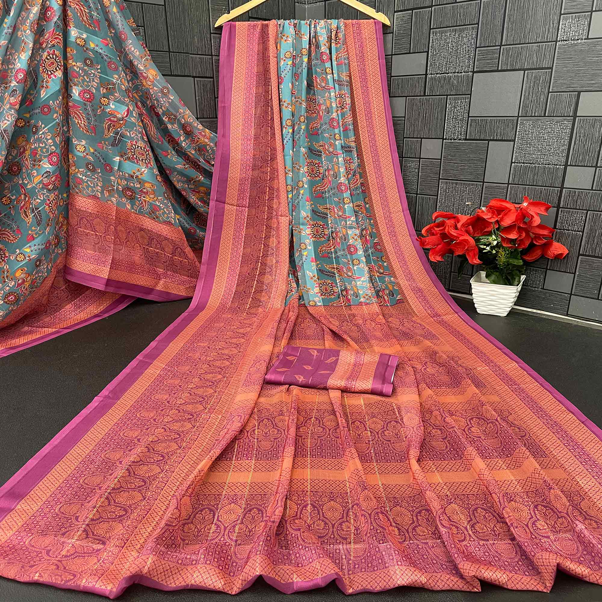 Elegant Rama Blue & Magenta Floral Digital Printed Georgette Saree Adorned With Subtle Zari Stripes
