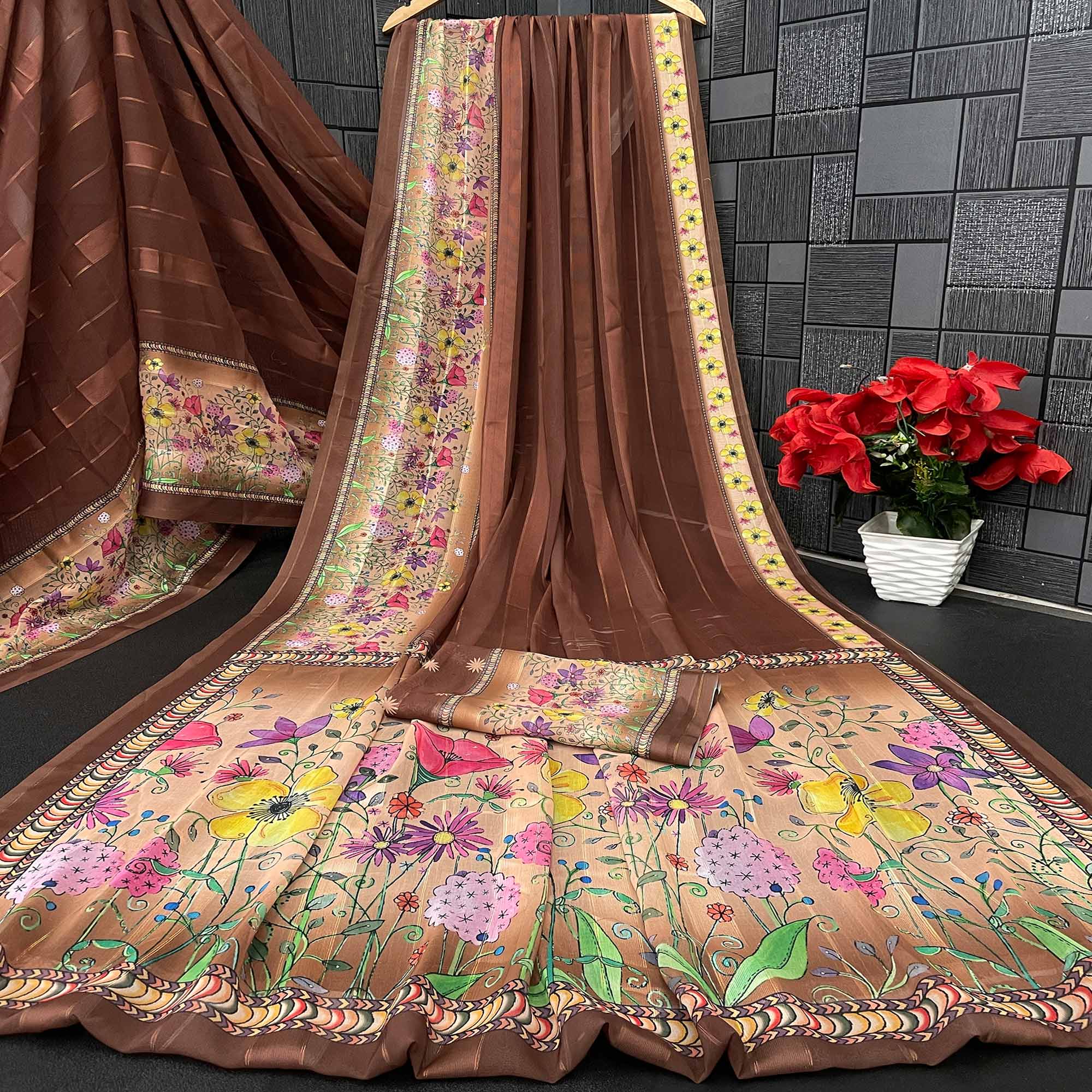 Charming Brown Floral Digital Printed Georgette Saree Accentuated With Zari Stripes