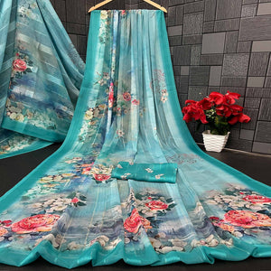 Charming Turquoise Blue Floral Digital Printed Georgette Saree Accentuated With Zari Stripes