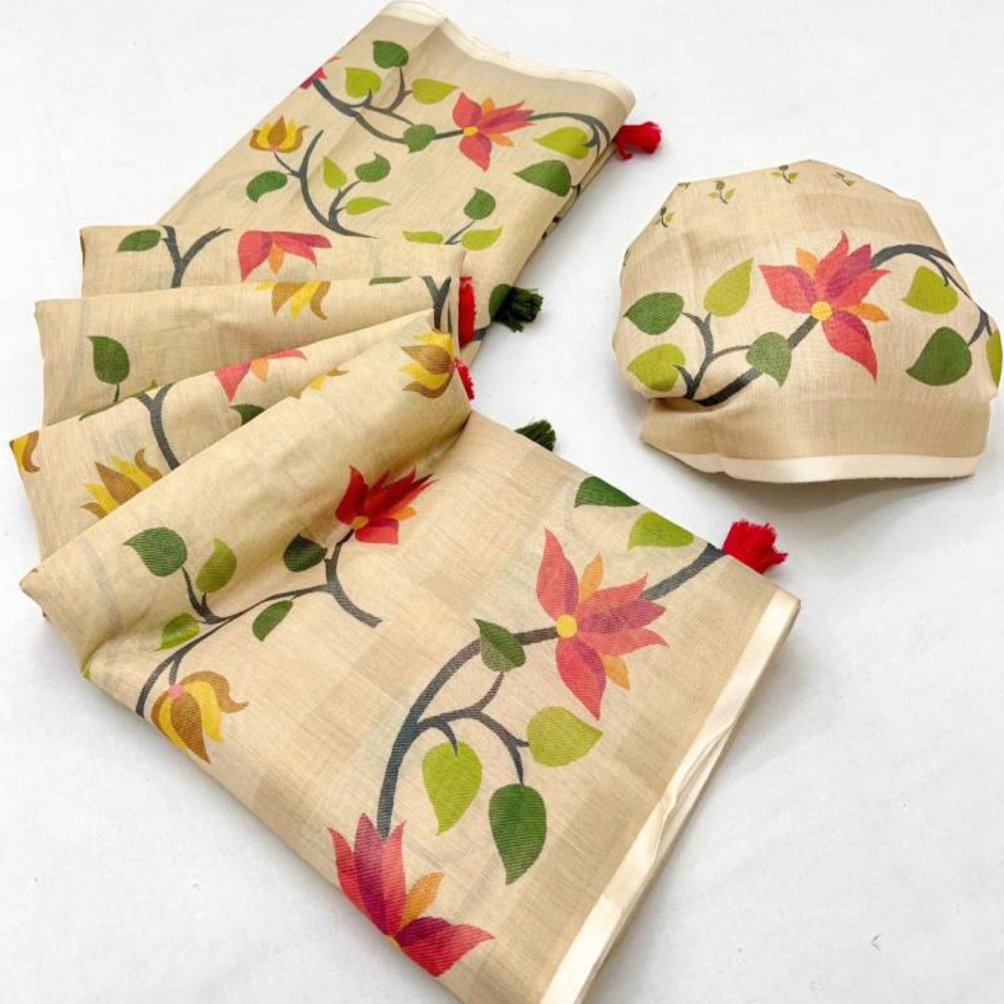 Beige Floral Printed Tissue Cotton Silk Saree Enhanced with a Classic Zari Weaving Border