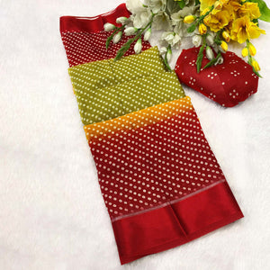 Designer Bandhani Saree in Green & Red Crafted from Soft Moss Georgette
