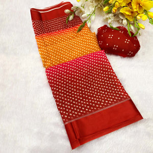 Designer Bandhani Saree in Mustard & Red Crafted from Soft Moss Georgette