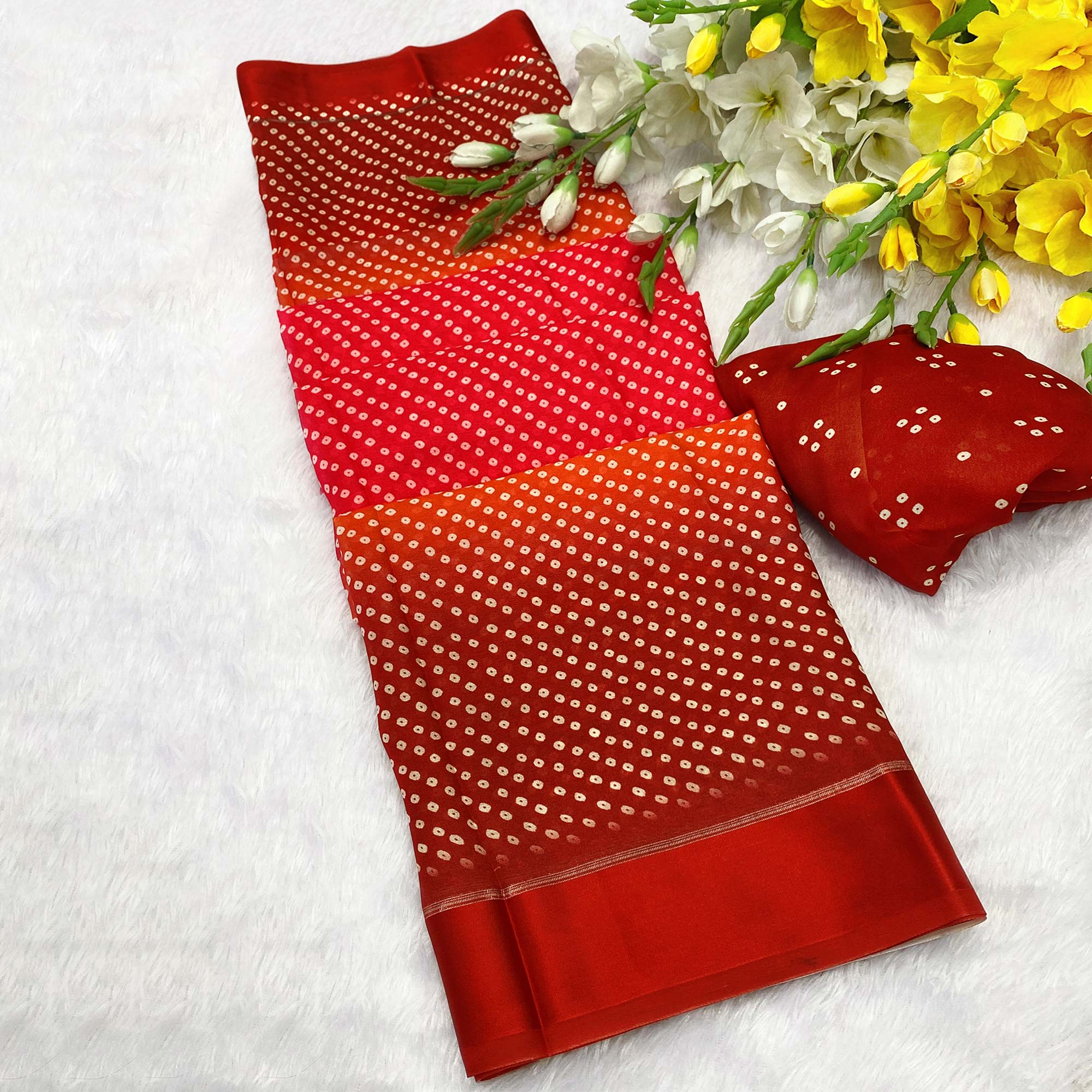 Designer Bandhani Saree in Red Crafted from Soft Moss Georgette