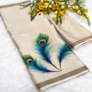 Charming Cream Soft Tussar Cotton Silk Saree With Peacock Feathers Print