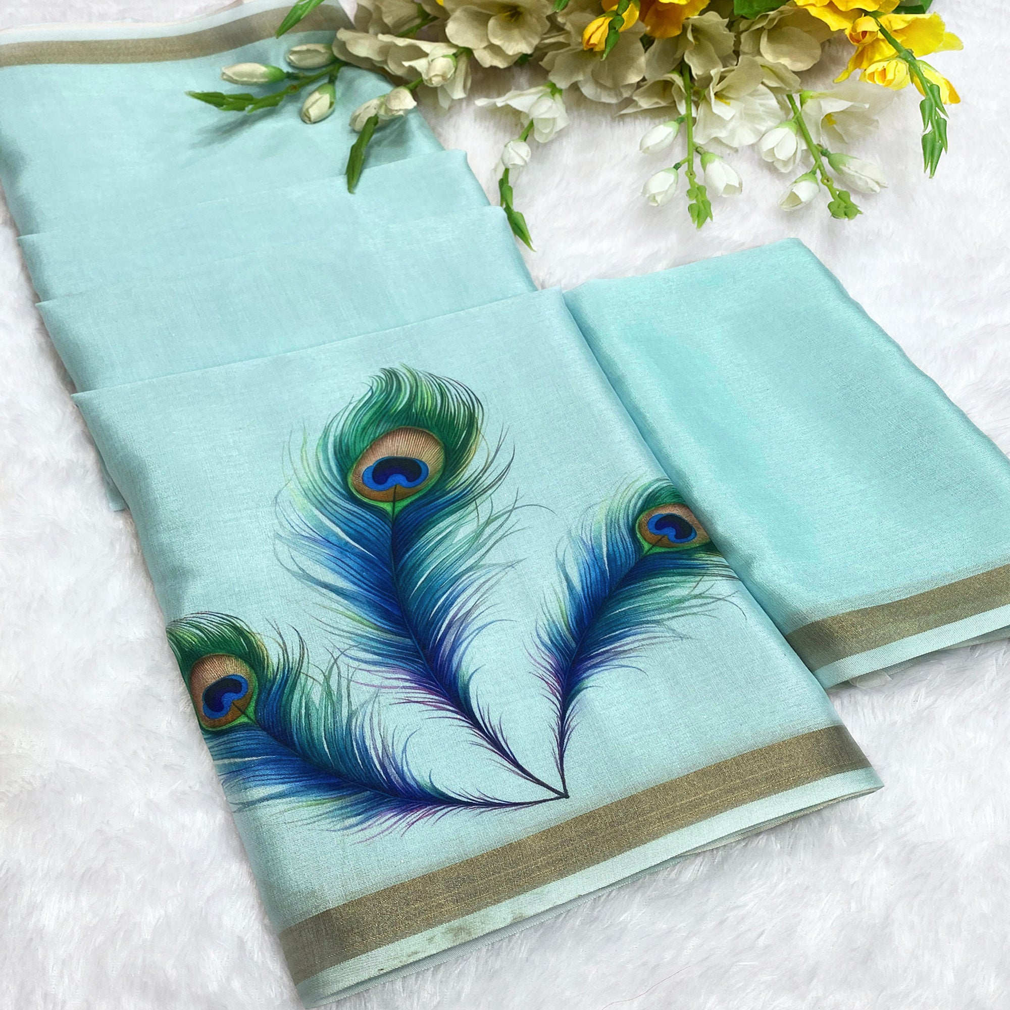 Charming Blue Soft Tussar Cotton Silk Saree With Peacock Feathers Print