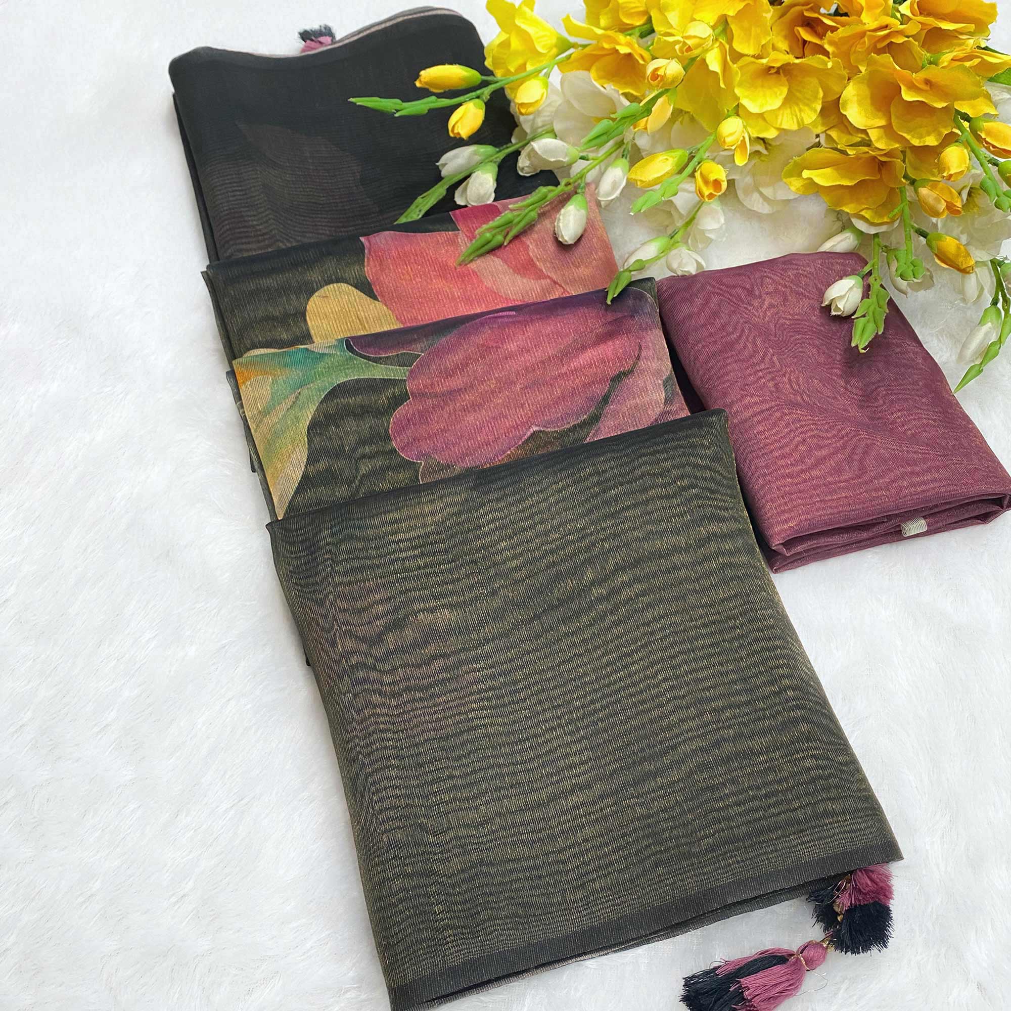 Sophisticated Black Floral Digital Print Tissue Saree Enhanced With Handmade Tassels