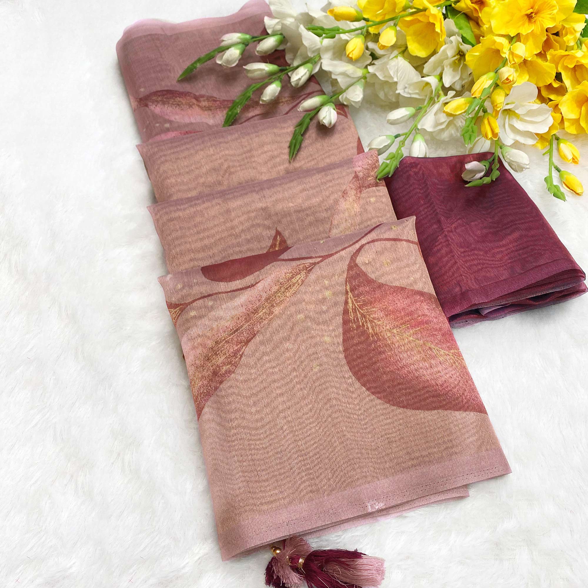 Sophisticated Light Mauve Floral Digital Print Tissue Saree Enhanced With Handmade Tassels
