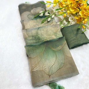 Sophisticated Dusty Green Floral Digital Print Tissue Saree Enhanced With Handmade Tassels