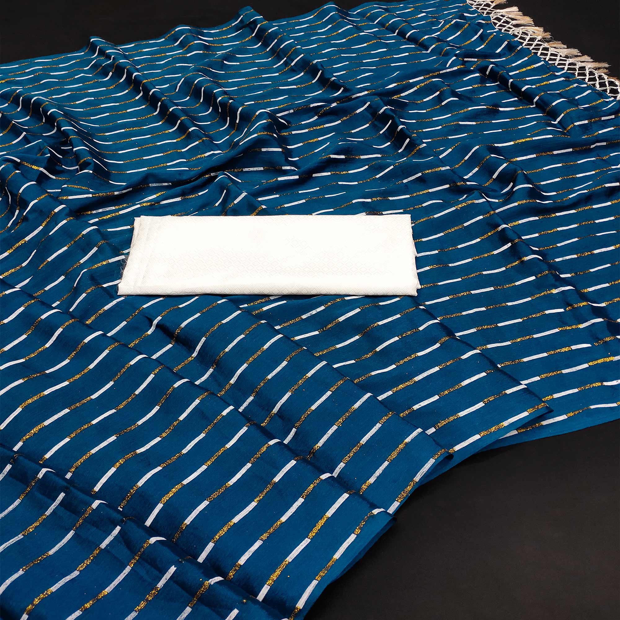 Teal Blue Printed Chiffon Saree With Tassels