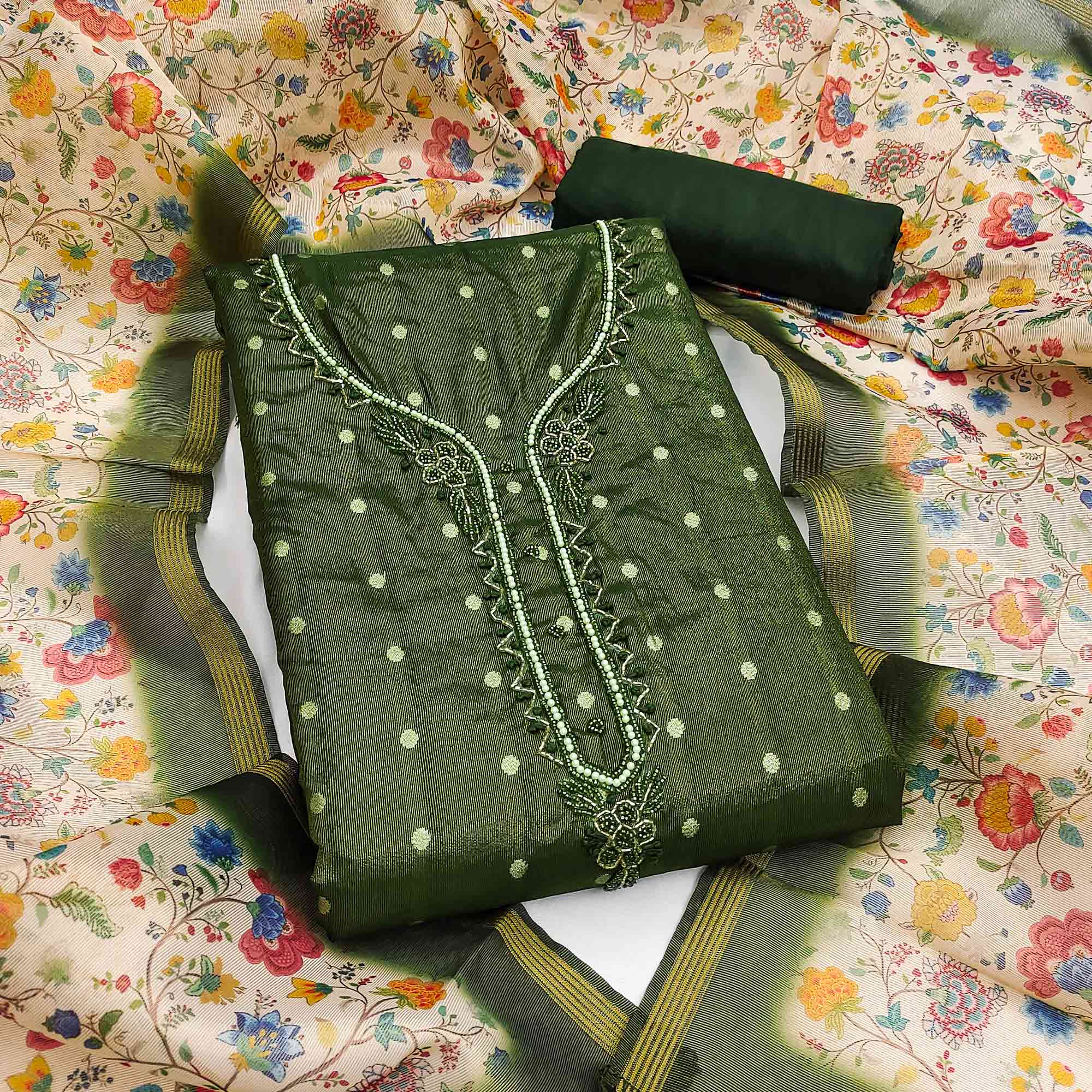 Festive Mehendi Green Net Dress Material Accented with Intricate Zari Weaving