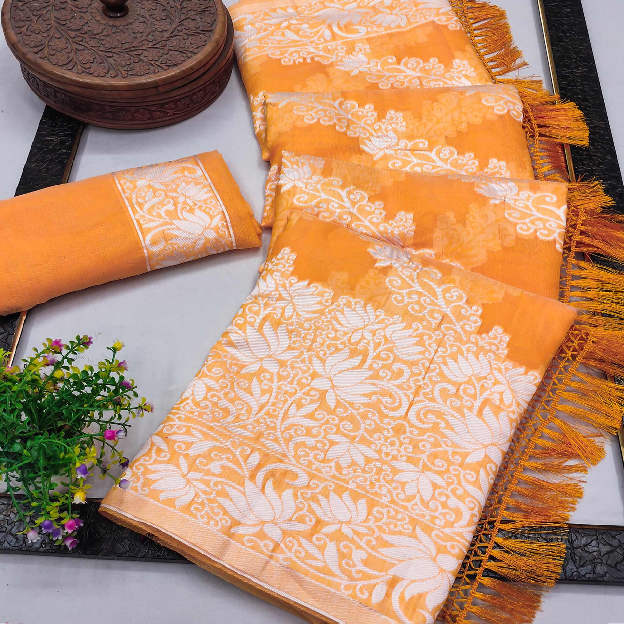 Orange Floral Woven Banarasi Silk Saree With Tassels