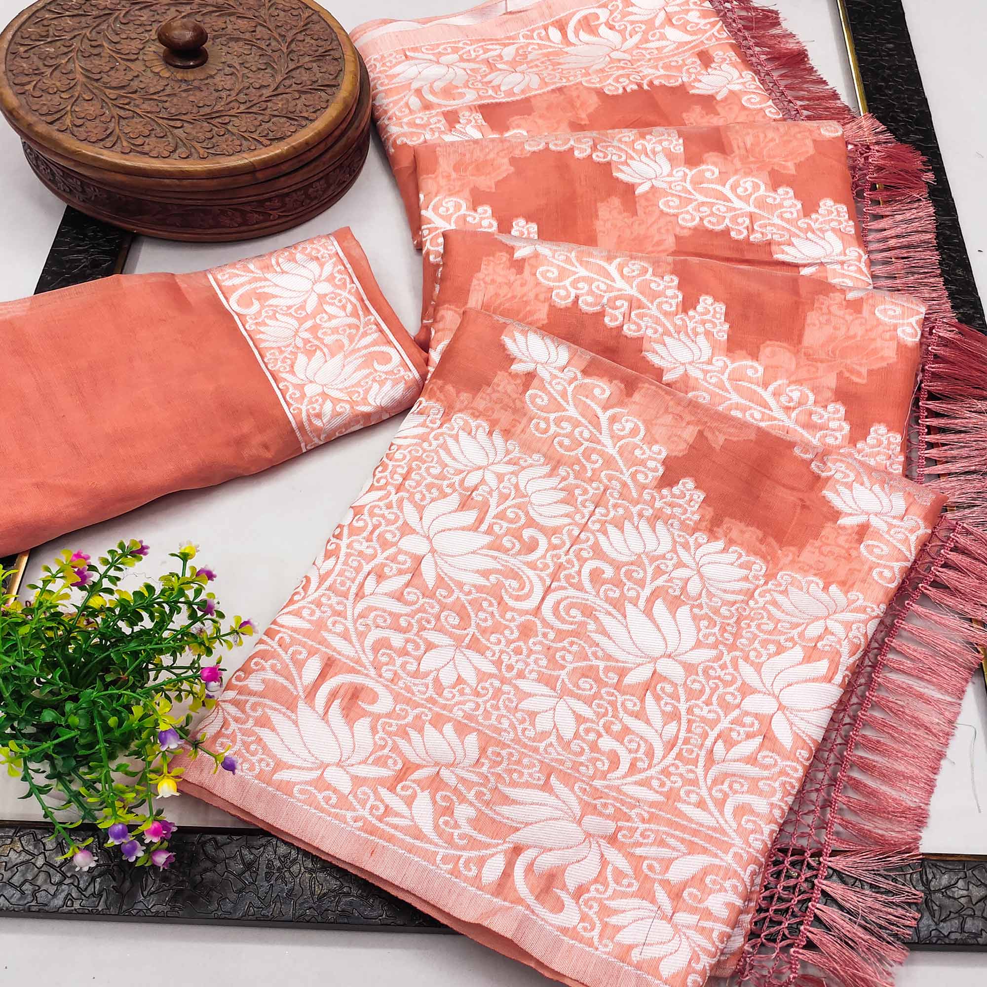 Peach Floral Woven Banarasi Silk Saree With Tassels