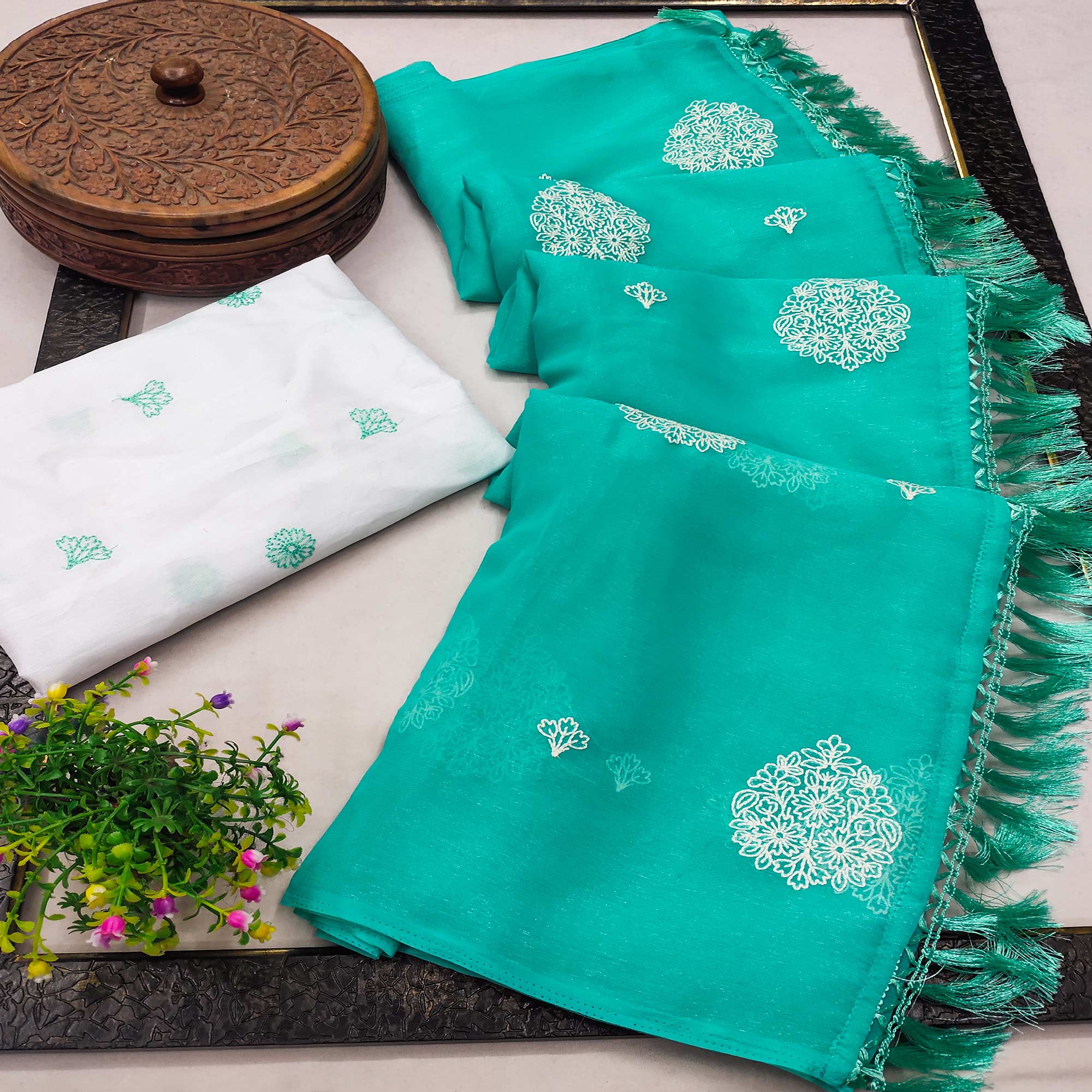 Turquoise Embroidered Chiffon Saree With Elegant Tassel Borders