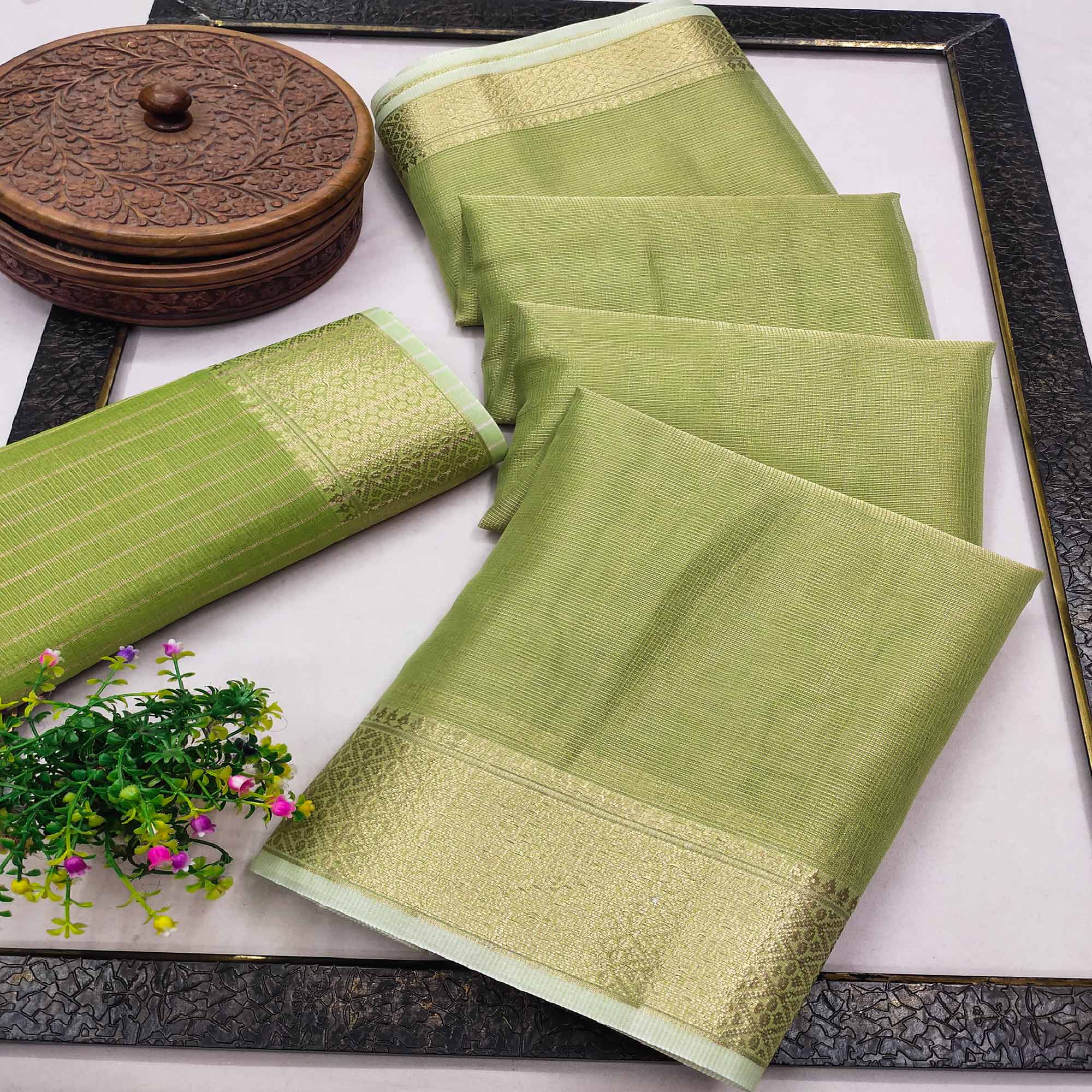 Subtle Solid Green Kota Doria Saree with Traditional Zari Weaving Edging