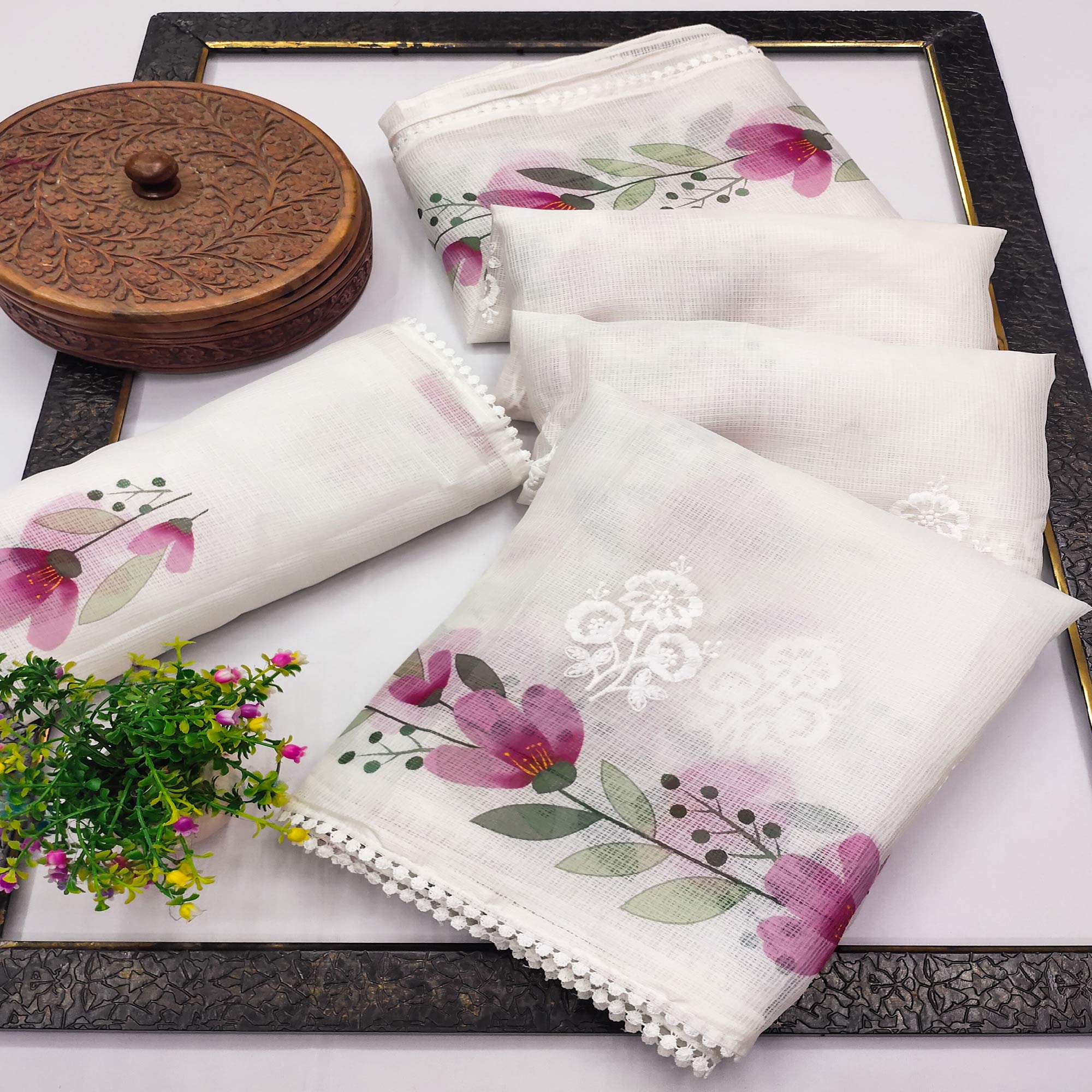 White Saree in Sheer Kota Doria Fabric with Floral Patterns and Intricate Embroidery