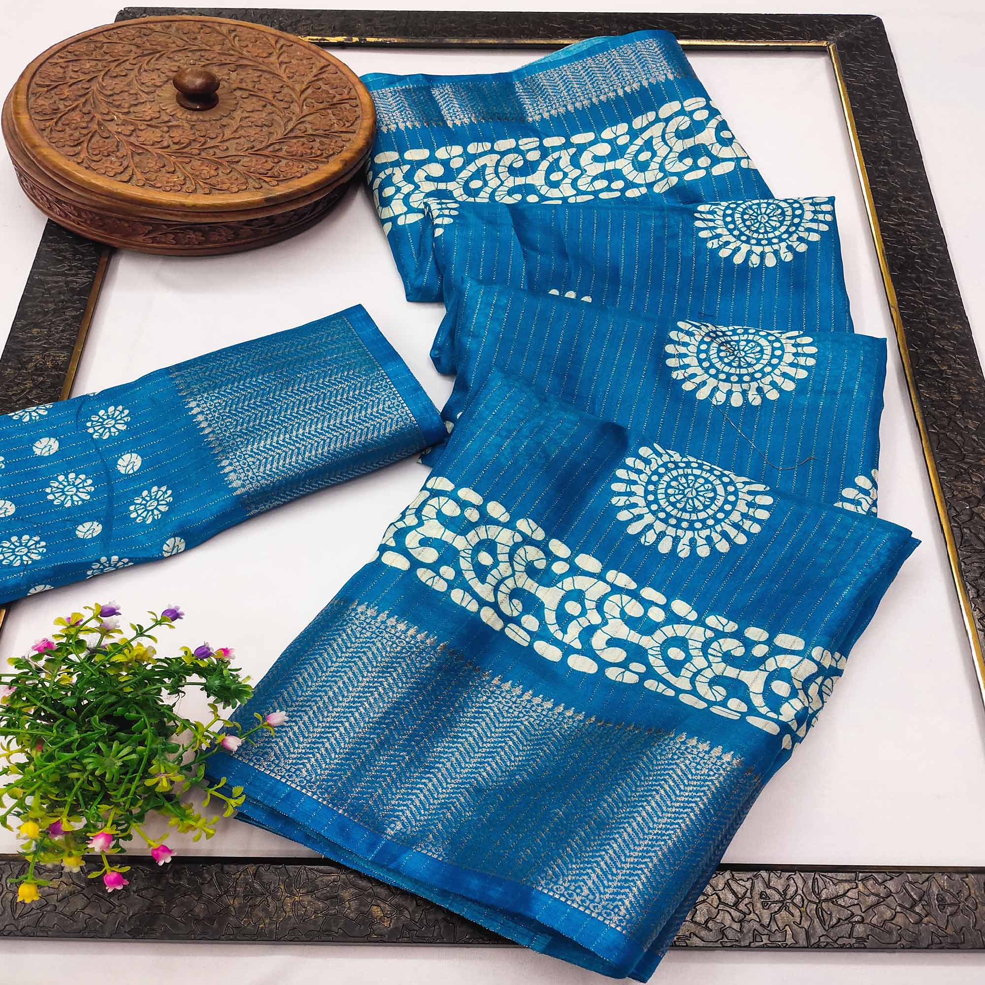 Classic Blue Dola Silk Saree Adorned with Floral Motifs & Rich Zari Work