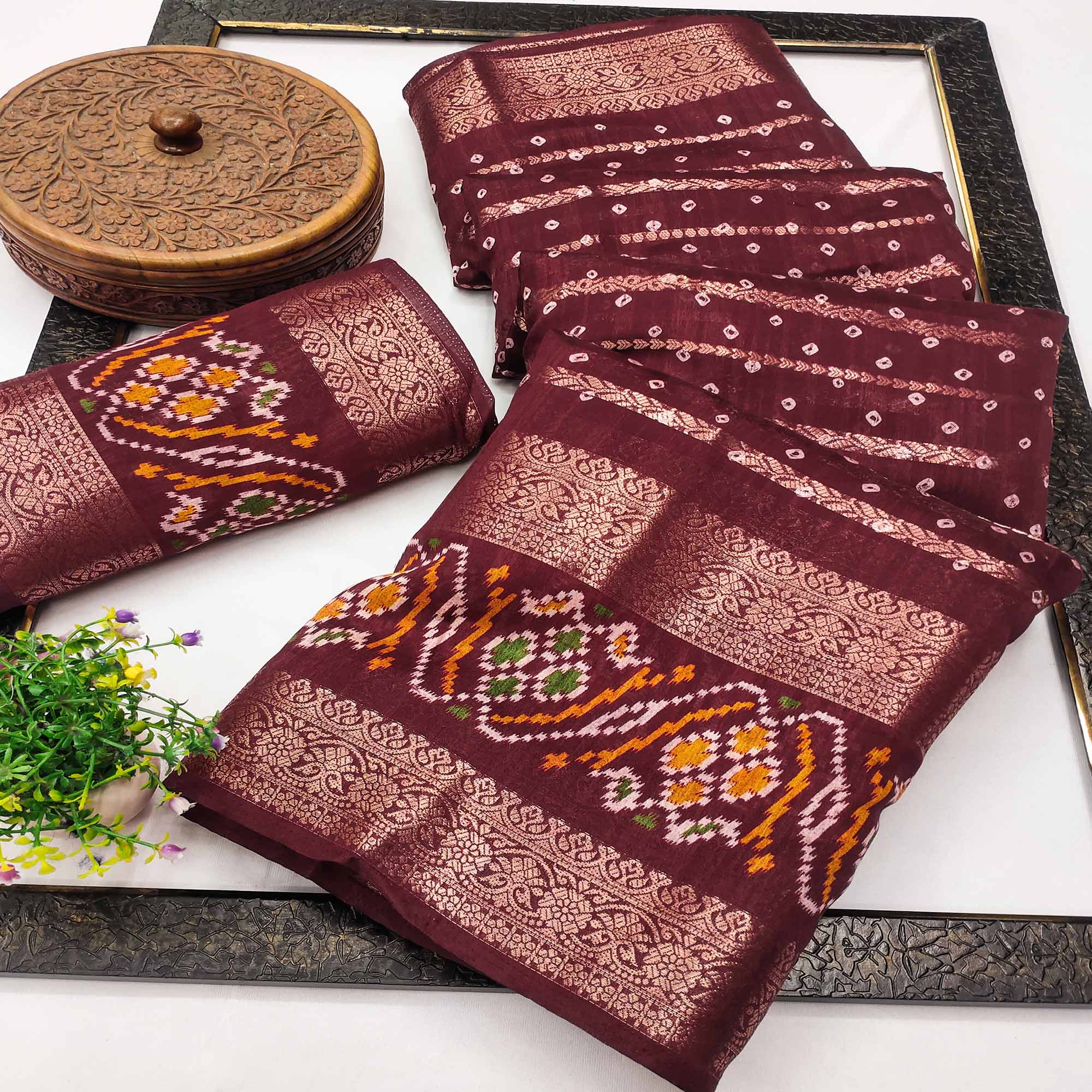 Maroon Bandhani Printed Dola Silk Saree Enhanced With Fine Weaving Accents
