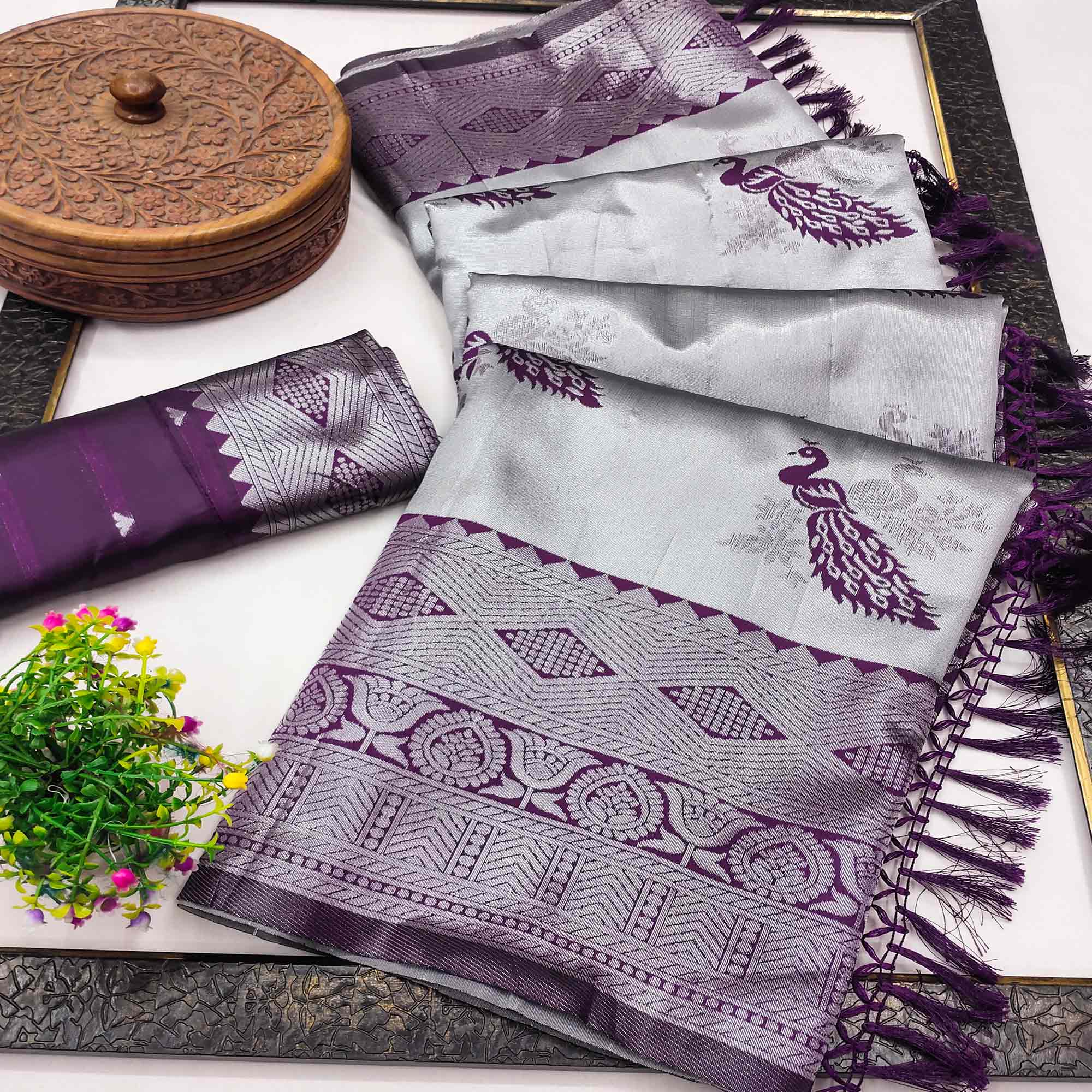 Grey Banarasi Silk Saree Featuring Zari Weaving Peacock Pattern & Luxe Tassels