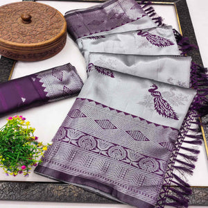 Grey Banarasi Silk Saree Featuring Zari Weaving Peacock Pattern & Luxe Tassels