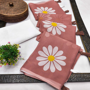 Brown Georgette Saree Featuring Delicate Floral Prints & Tassels Pallu