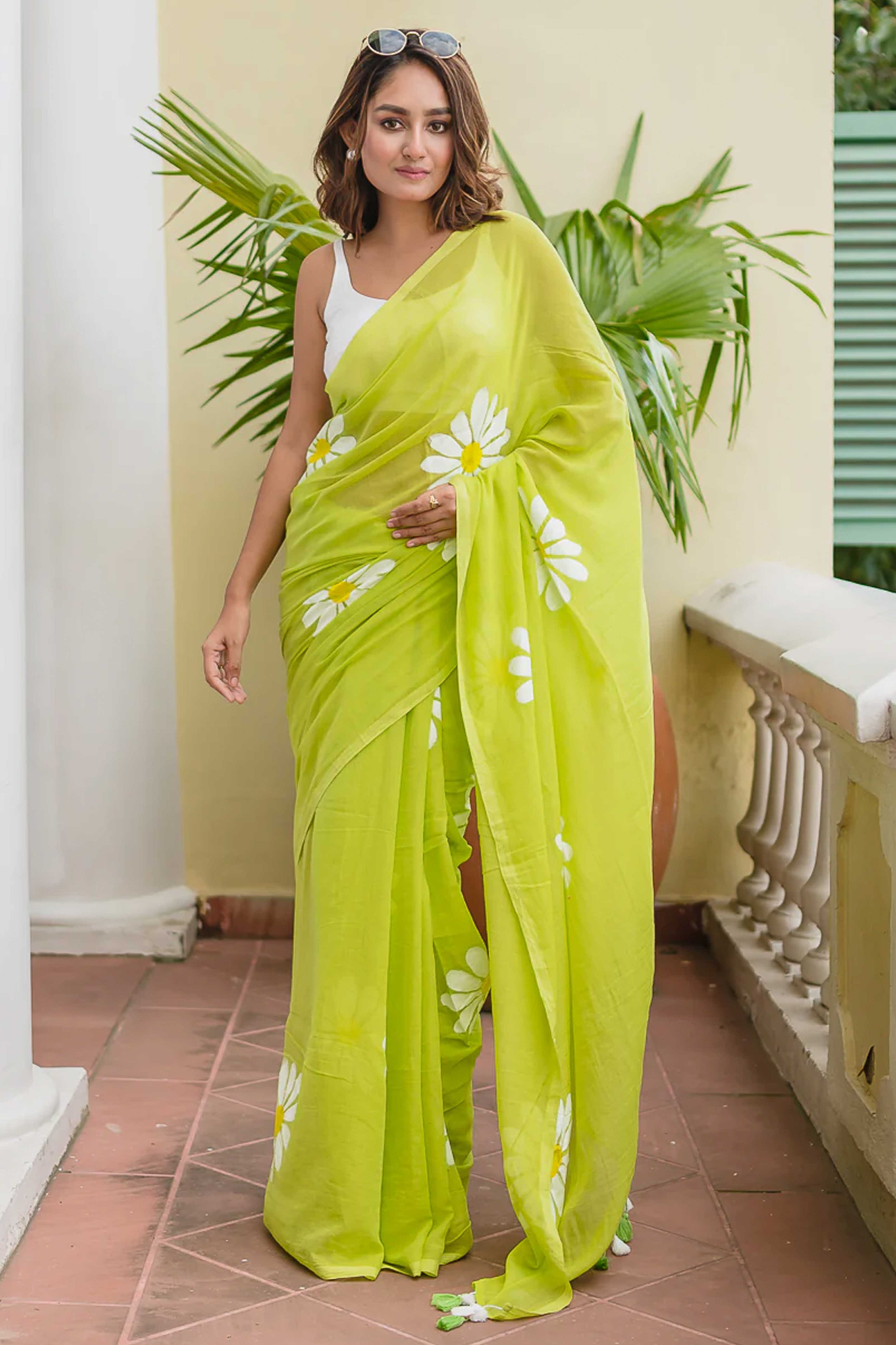 Refreshing Green Georgette Saree Featuring Delicate Floral Prints & Tassels Pallu