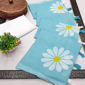 Sky Blue Georgette Saree Featuring Delicate Floral Prints & Tassels Pallu