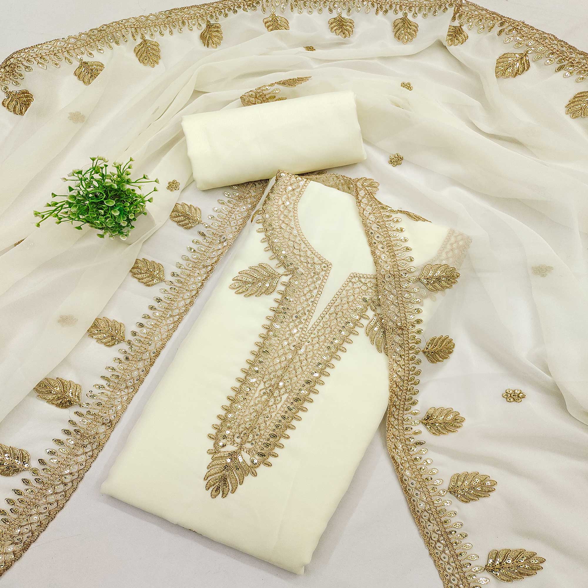 Off White Ethnic Dress Material in Georgette with Embroidery Off White Ethnic Dress Material in Georgette with Embroidery