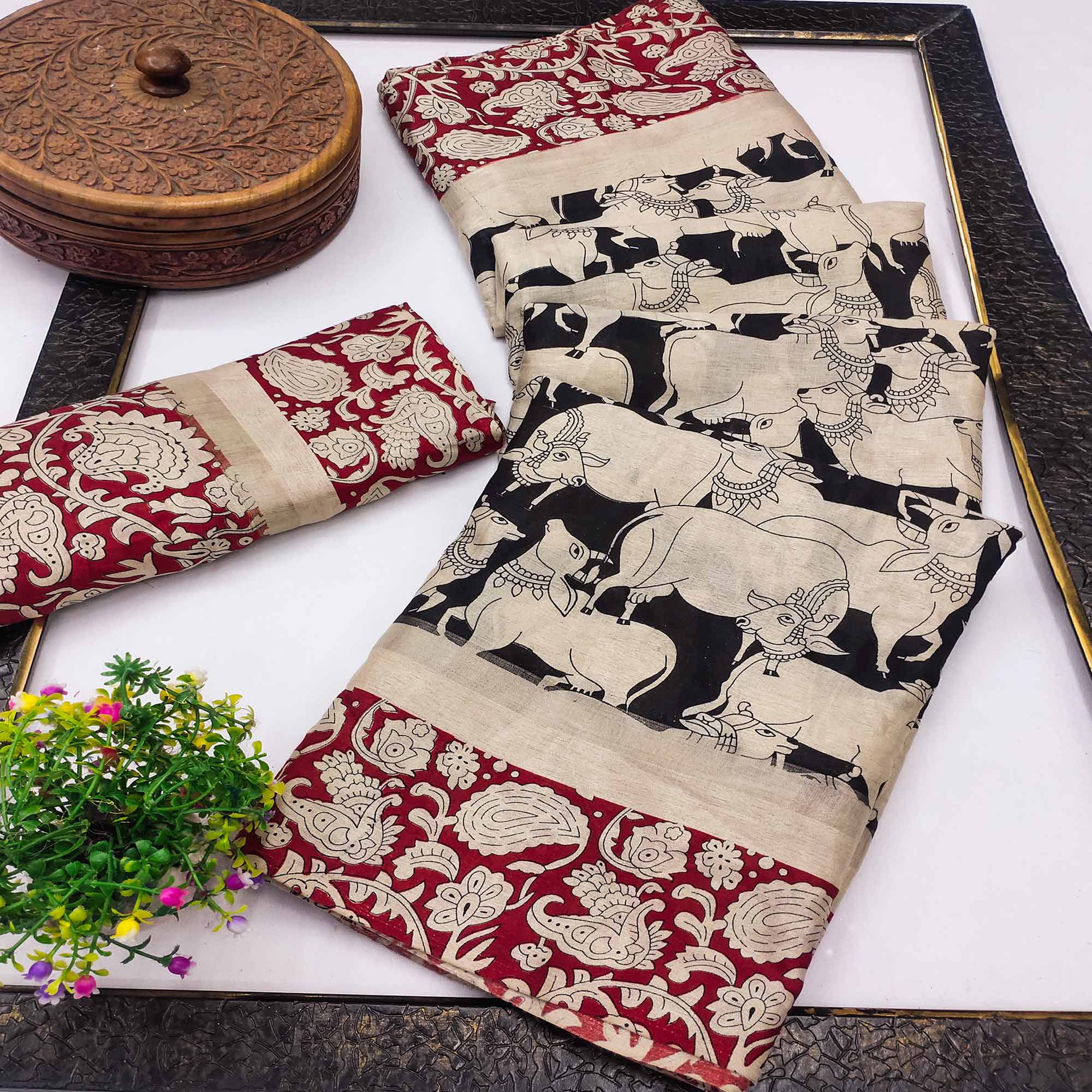 Black & Red Cotton Blend Saree Featuring Artistic Animal And Floral Print Fusion
