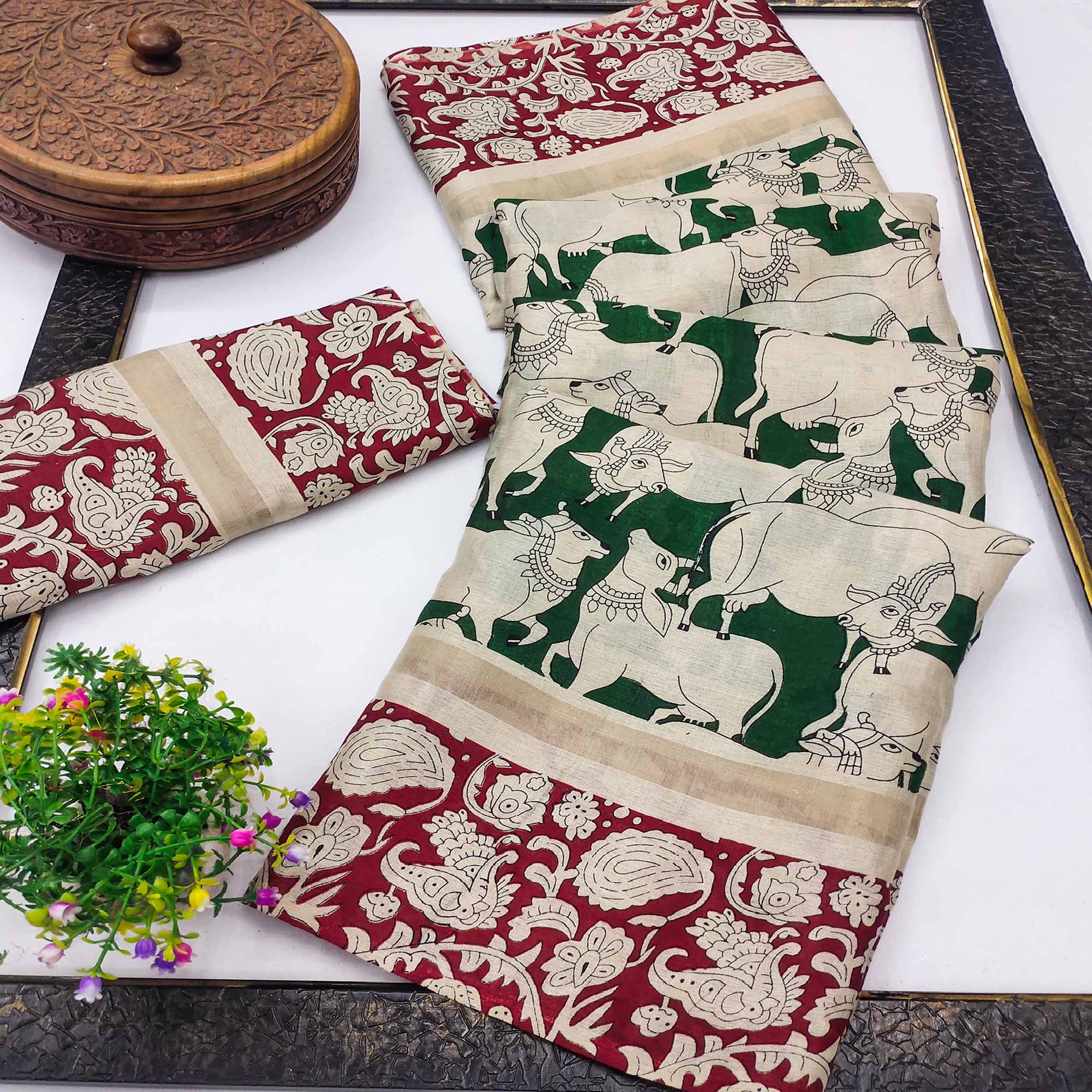 Green & Maroon Cotton Blend Saree Featuring Artistic Animal And Floral Print Fusion