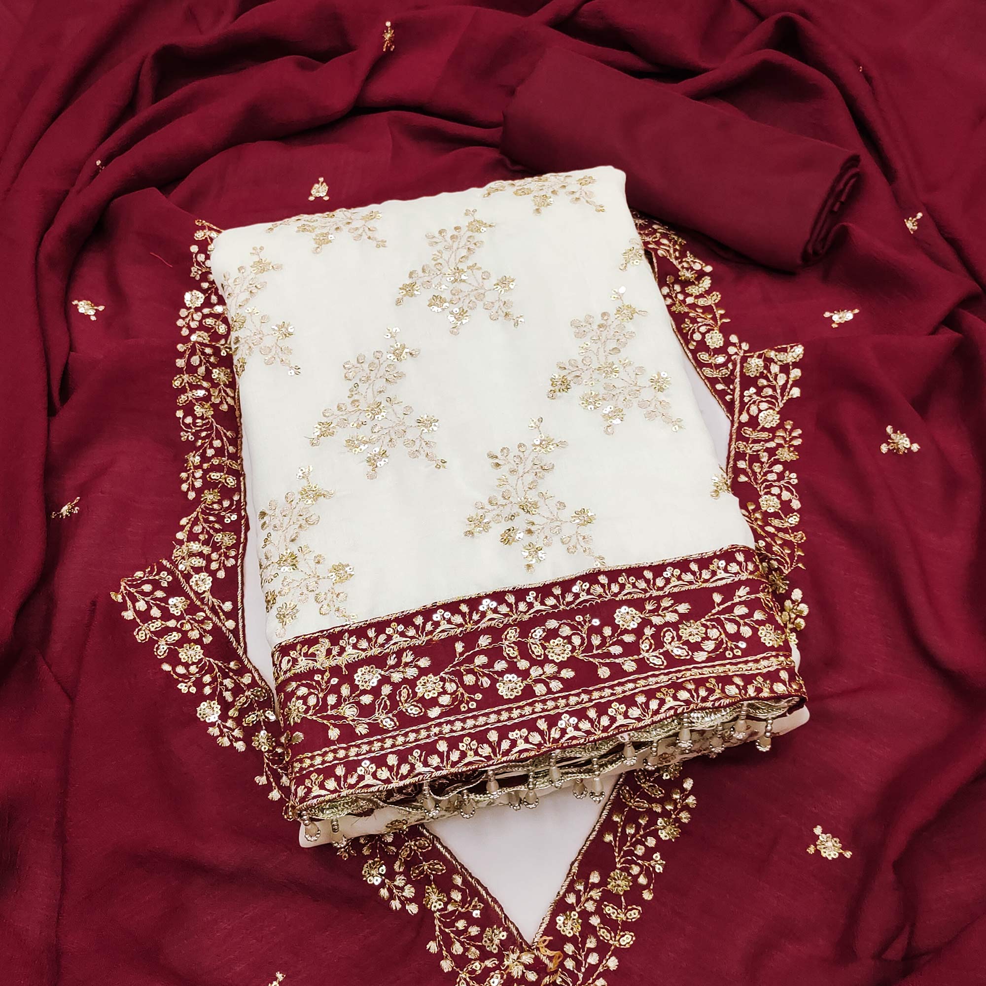 Maroon and Off White Vichitra Silk Fabric with Embroidered Detailing
