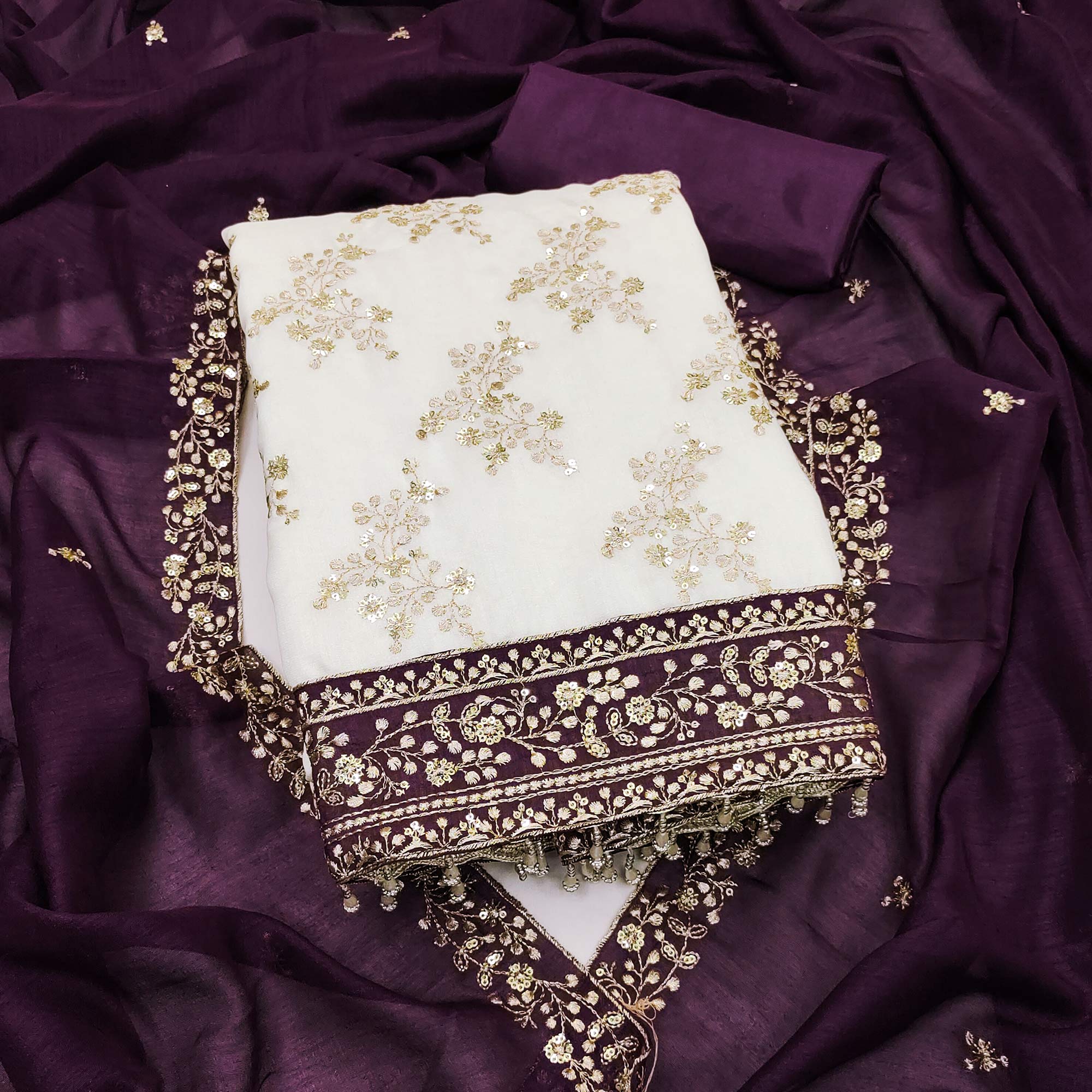 Purple and Off White Vichitra Silk Fabric with Embroidered Detailing