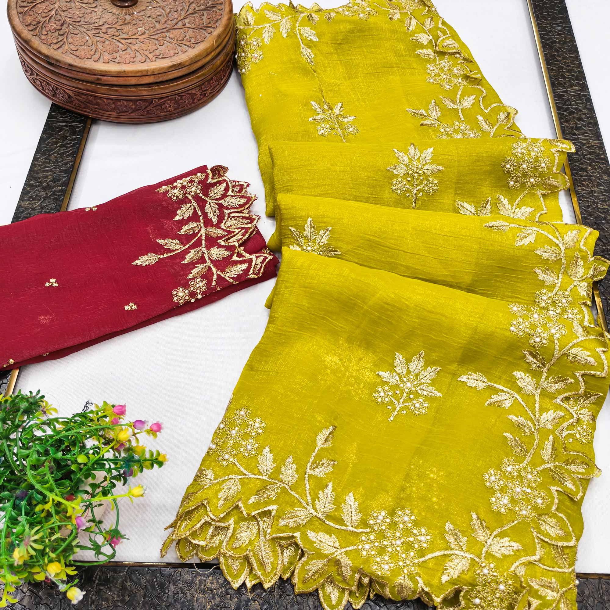 Regal Yellow Chiffon Saree Adorned with Intricate Golden Embroidery